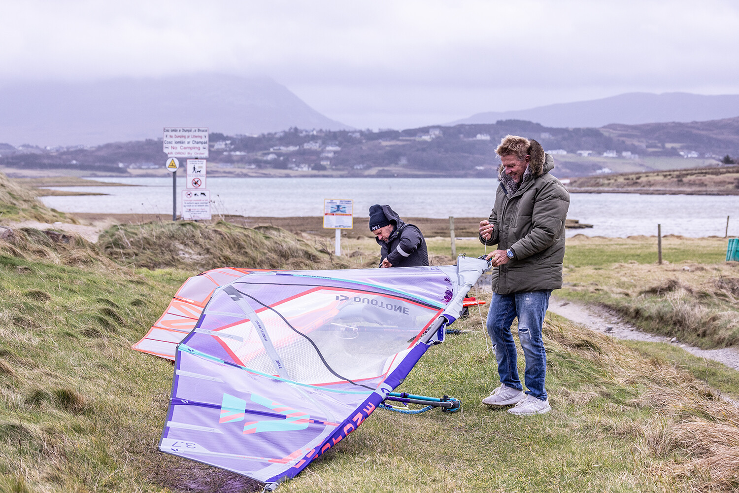 Rigging sails before a session