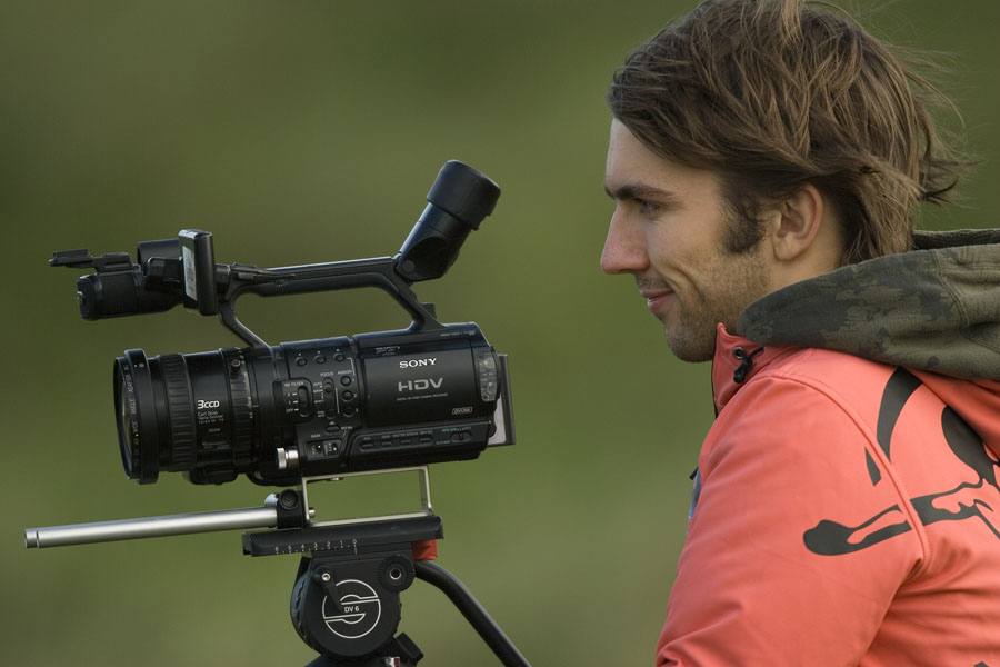 Tam Mullen filming with a camcorder
