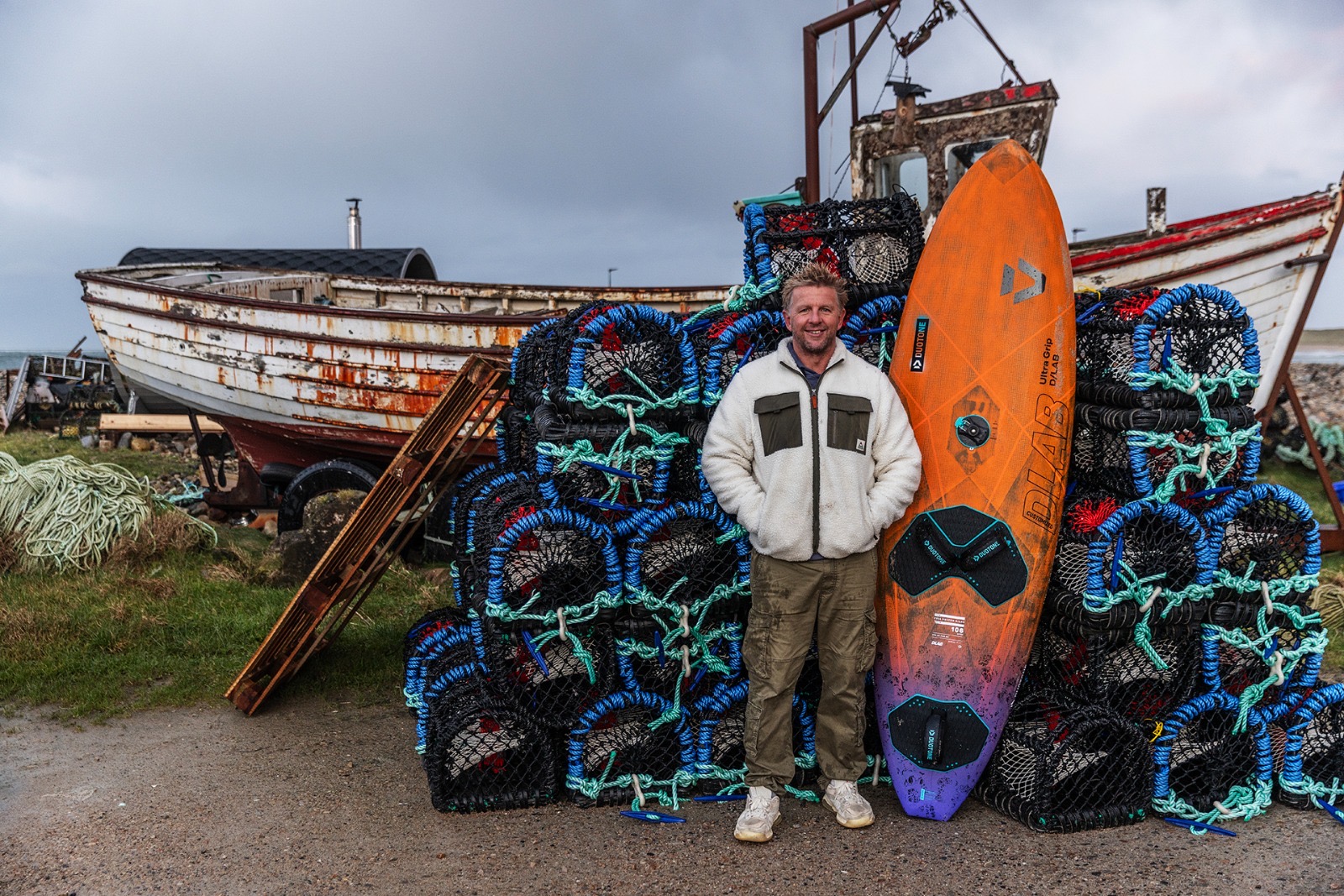 Timo Mullen with his windsurf board